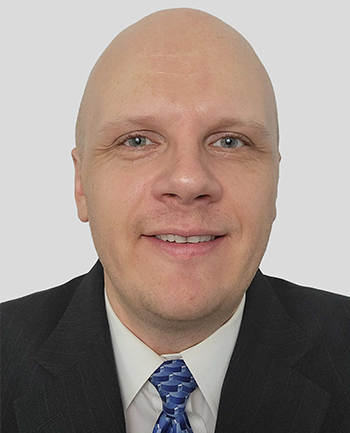 Headshot of Adam Andrews