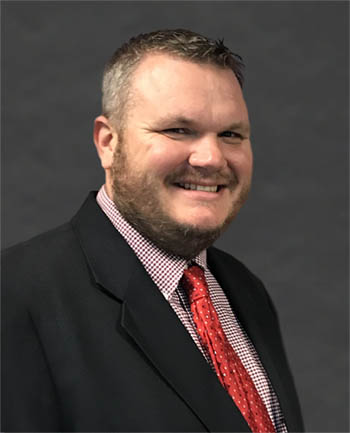 Headshot of Michael Corrigan