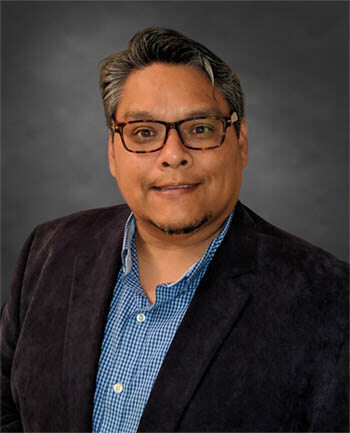 Headshot of Carlos Unzueta