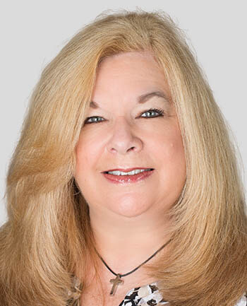 Headshot of Laura Scudder