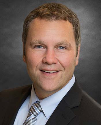 Headshot of Brett Leschinsky