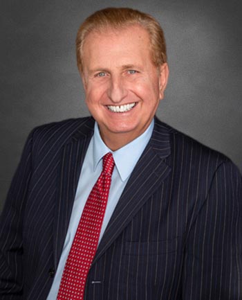 Headshot of Ron Abisi