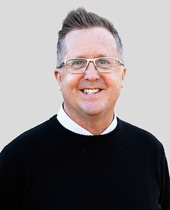 Headshot of John Leach