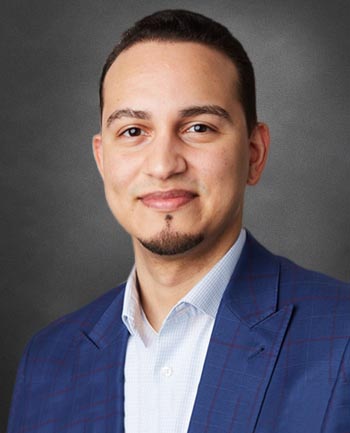 Headshot of Llewellyn Scott Tejada