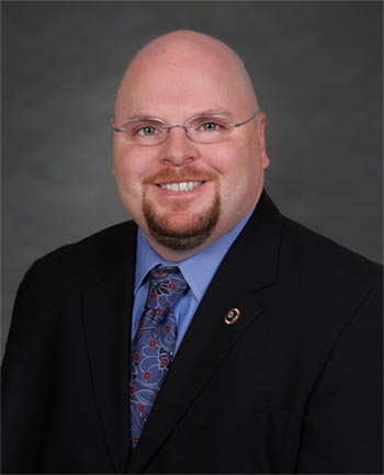 Headshot of Brian Maguire