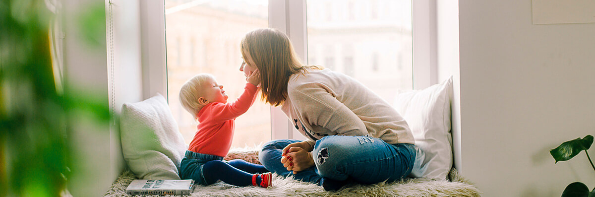 VA Home Loans A veteran playing with her child